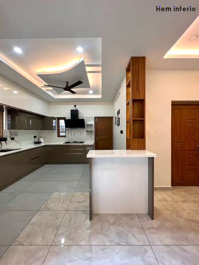 Home interior @edappally 

 #homeinteriordesign #ModularKitchen #DiningTableAndChairs #cielingdesign #architrave #partitiondesign #washunitdesign #StaircaseDecors #interiordesignkerala #interiordesignkochi #moderninteriors #residentialinteriordesign #Architectural&Interior