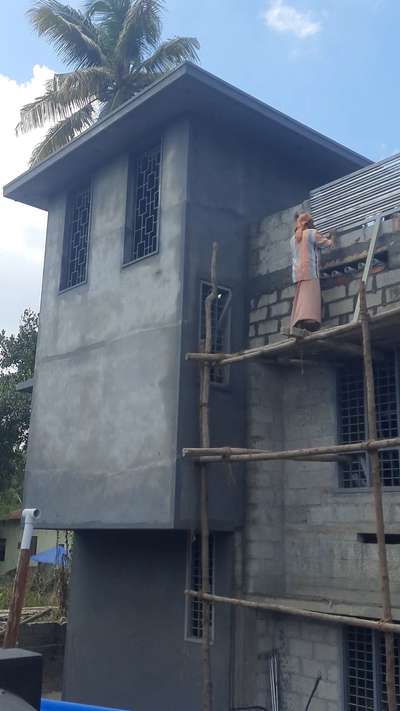 External plastering work progressing at sreekariyam