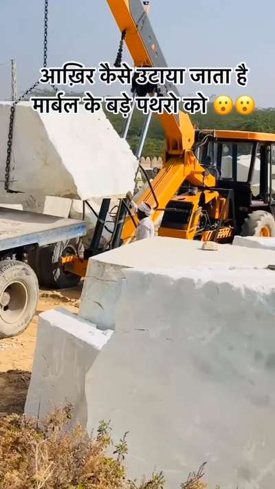 Makrana Marble Block Hanging on Crain.  Marble manufacturers. Mangal Bhavan Marbles Jaipur