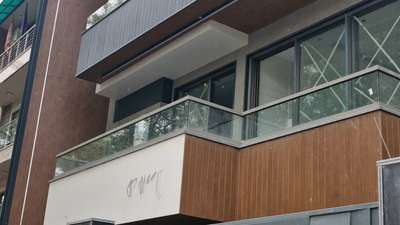 Glass Balcony Railing with Powder Coated Aluminium Top and Bottom Railing Profile.