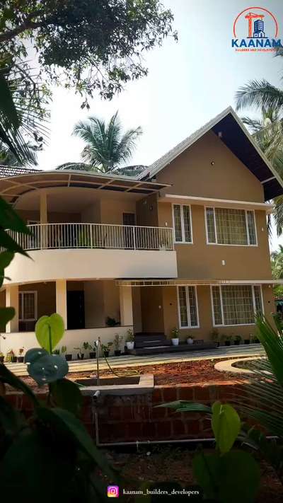 ✨ Another Dream Home Delivered by KAANAM BUILDERS AND DEVELOPERS ✨

We are proud to hand over this beautifully crafted two-storey home designed to blend comfort, elegance, and functionality — all perfectly tailored to our client’s lifestyle.

🏡 Project Highlights:
• 3 Spacious Bedrooms with excellent natural lighting
• Large Living Room designed for warmth and togetherness
• Modern Verity Open Kitchen paired with a stylish Dining Hall
• Impressive TV Area for a premium entertainment experience
• Dual-Direction Staircase adding elegance and easy access
• Dedicated Study Area with refreshing exterior views
• Relaxing Balcony to enjoy peaceful mornings and calm night breezes
• Low-Cost, Attractive Interiors customized exactly as per the client’s needs

🌿 Stepping outside, the home features an exterior design inspired by the charm of a mini park, built to perfectly suit the weather conditions of Kerala — ensuring durability, beauty, and long-term comfort.

📐 Total Area: 2600 sq. ft.