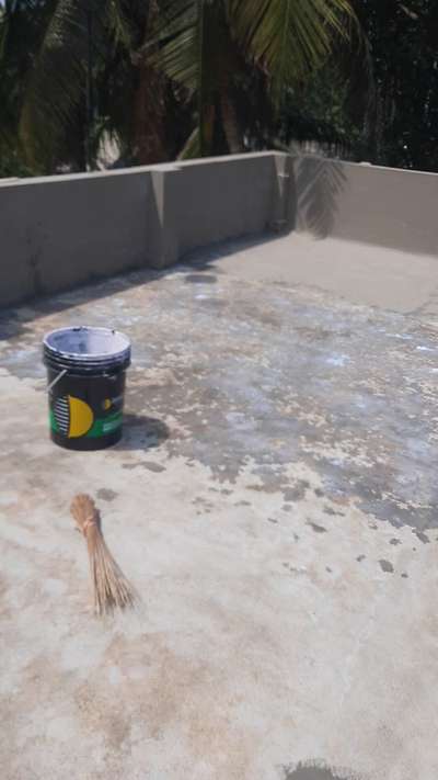 Primary coat application on parapet walls ...