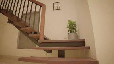 Floating staircase maded with metal,wood & iron rop fittings .