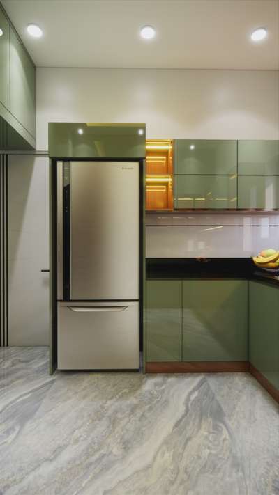 Modern elegance in every detail 
A perfect balance of glossy greens, warm wood, and ambient lighting designed for contemporary living.


#ModernKitchen#LuxuryKitchen #InteriorDesigner✔️✔️  #