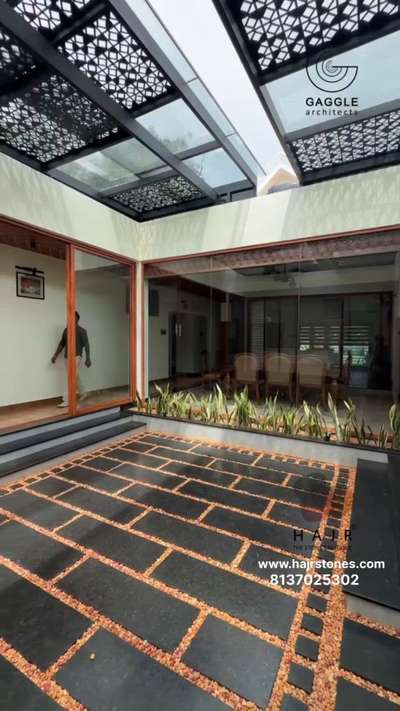 Courtyard design stone work kerala wayanad