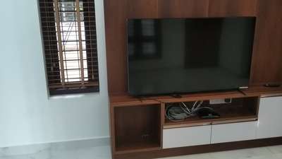 #Home interior.
# T. v unit.
# Cot.
# Iron table.
# Wardrobe.