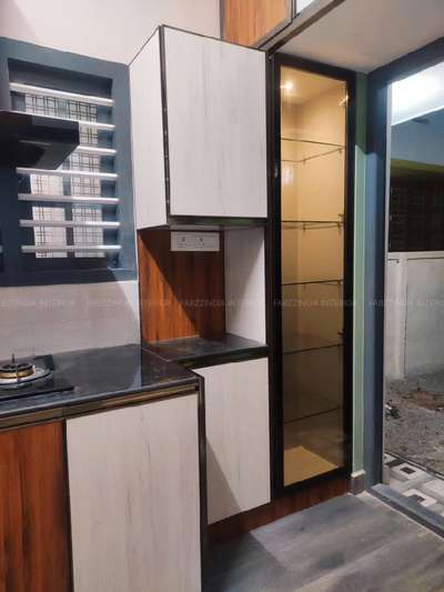 Glass Tall unit... contact us 🤝 #tallunit  #HomeDecor  #ModularKitchen  #SmallHouse  #SmallKitchen  #InteriorDesigner  #simpleexterior  #KitchenInterior  #LShapeKitchen  #Palakkad  #budgethomes  #pvckitchan  #aluminium