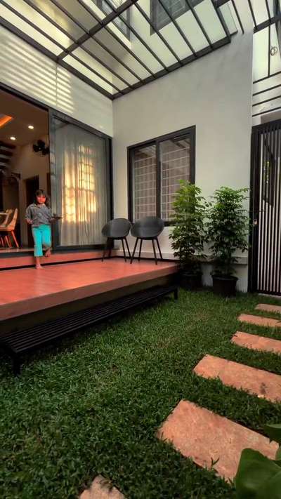 #patio വീടിനെ മനോഹരമാക്കാൻ, നല്ല രീതിയിൽ കാറ്റും വെളിച്ചവും കിട്ടത്തക്ക രീതിയിൽ, ഡിസൈൻ ചെയ്തത്.....  #architecturedesigns #patioview #IndoorPlants #InteriorDesigner #beautifulhouse #modernhome #modernhouse #Architectural&Interior