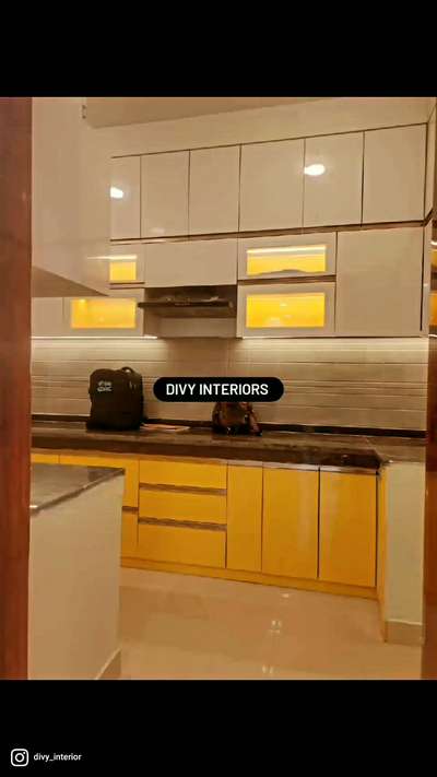 divy_buildwellThe new_ age modular kitchen has become a popular addition within urban Indian homes because it is customised as per the requirements of the homeowners.
Modular kitchen stand out when compared to the conventional.
Carpenter _ made ones because they are ergonomics they maximise storage and are convention to use.

@divy_buildwell 
@divy_buildwell 
@divy_buildwell 
@surendra_rathore15
@divy_interiors_noida_sector116 
@

.
.
.
.
.
.
.
.

#interiorspecialist #interior #kitchendesign #comingsoon #apartment #bestkitchen #inteeiordesign #designer #homedesigning #homeintrior #123 #bestigwoodworking #kitchen3d #reelskarofeelkaro #realestate #ace #luxury #bestinteriordesign #ghaziabad #noidadesigners #musturdyellow #kitcheninteriordesign #kitcheninteriordesign #kitchen101 #kitchenorganization #kitchenrenovation #modularkitchen #kitchenlife #kitchenforlike #whiteyellow designedlove