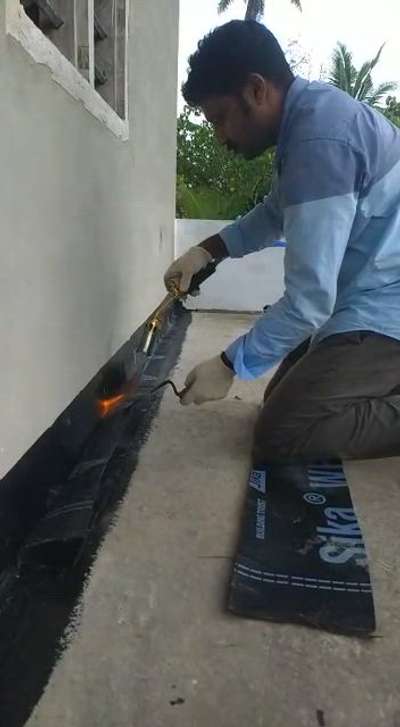 Roof wall joint  membrane waterproofing work for staircase room.