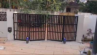 360 degri roatating ഗേറ്റ് wheel ഉപയോഗിച്ച് നിർമ്മിച്ച folding gate low budget ൽ 
ഓട്ടോമാഷൻ ചെയ്തപ്പോൾ.. #foldinggates