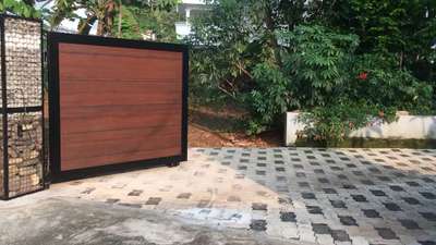 Automated 🕹️ functional gate with HPL sheet and Gabion pillar