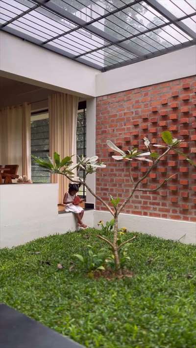 Vibes of Nadhi💚
Recently completed residential project at Trivandrum 
 #courtyard  #tropicalhouse #residentialinteriordesign #green⁠ #earthydesign #exposedbrick #HouseDesigns #TraditionalHouse