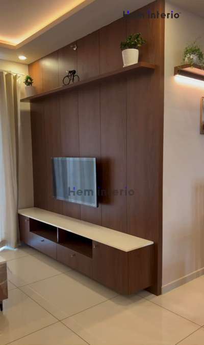 #heminterio  #tvunit  #LivingroomDesigns  #appartmentinterior  #InteriorDesigner  #Architectural&Interior  #homeinterior  #interiordesignersinkochi  #GypsumCeiling  #HomeDecor  #diningarea  #Dining/Living  #diningroomideas  #diningroominteriors