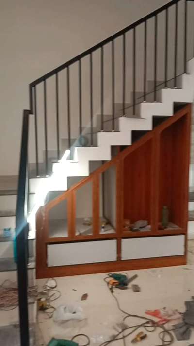 A small Renovation.. 
@crafted for Happiness  #StaircaseDecors  #stairdeaign  #Washroom  #understairsstorage  #mirrorunit