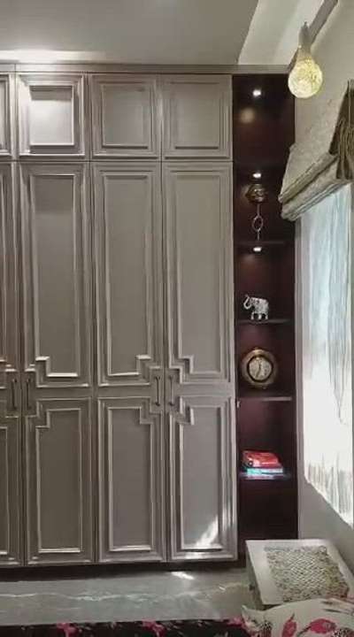 classiccal wardrobe with plain glass design