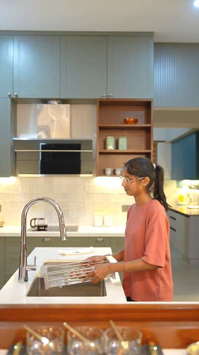A kitchen that speaks class, craftsmanship & comfort. ✨
From custom PU finish cabinetry to teak accents, premium quartz countertops, and classic ceramic wall tiles — every detail is designed to feel timeless and luxurious.

Finished with crystal pendant lights that elevate the entire space 💎
If you’re planning a premium kitchen upgrade, this is how elegance looks when it’s done right.

📩 DM us to design your dream kitchen
📍 Kerala | Custom interiors | Turnkey solutions

#likahdesignstudio #premiumkitchendesign #luxurykitchens**  #keralainteriorsneedwork 
#customkitchen #pufinishkitchen 
#quartzcountertops  #teakwoodinteriors  
#modularkitchenkerala 
#interiordesignkerala 
#homeinteriordesigncompany  #kitcheninspiration  
#luxuryinteriors  #turnkeyinteriors  #dreamkitchen