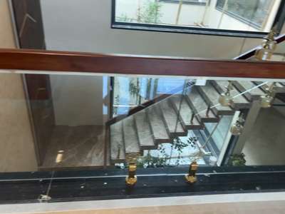 Wooden Glass Railing Done!!
 #woodenrail 
 #woodenrailing 
 #woodenrailings 
 #goldencolour 
 #pvdcoating 
 #Pvd 
 #pvdrailing 
 #pvdfinish 
 #GlassHandRailStaircase 
 #GlassStaircase 
 #glassstairrailing 
 #glassstair 
 #glassstaircasesolutions 
 #glassstaircasetrends 
 #glassstaircaseinstallation 
 #glassstaircasehandrail 
 #glassstaircaseinspiration 
 #sswork 
 #wood+ss+glass 
 #ssglassrailing 
 #handrailsforkings 
 #handrailwork 
 #railingglass 
 #steel_glass_railing 
 #WoodenStaircase 
 #railingdesing